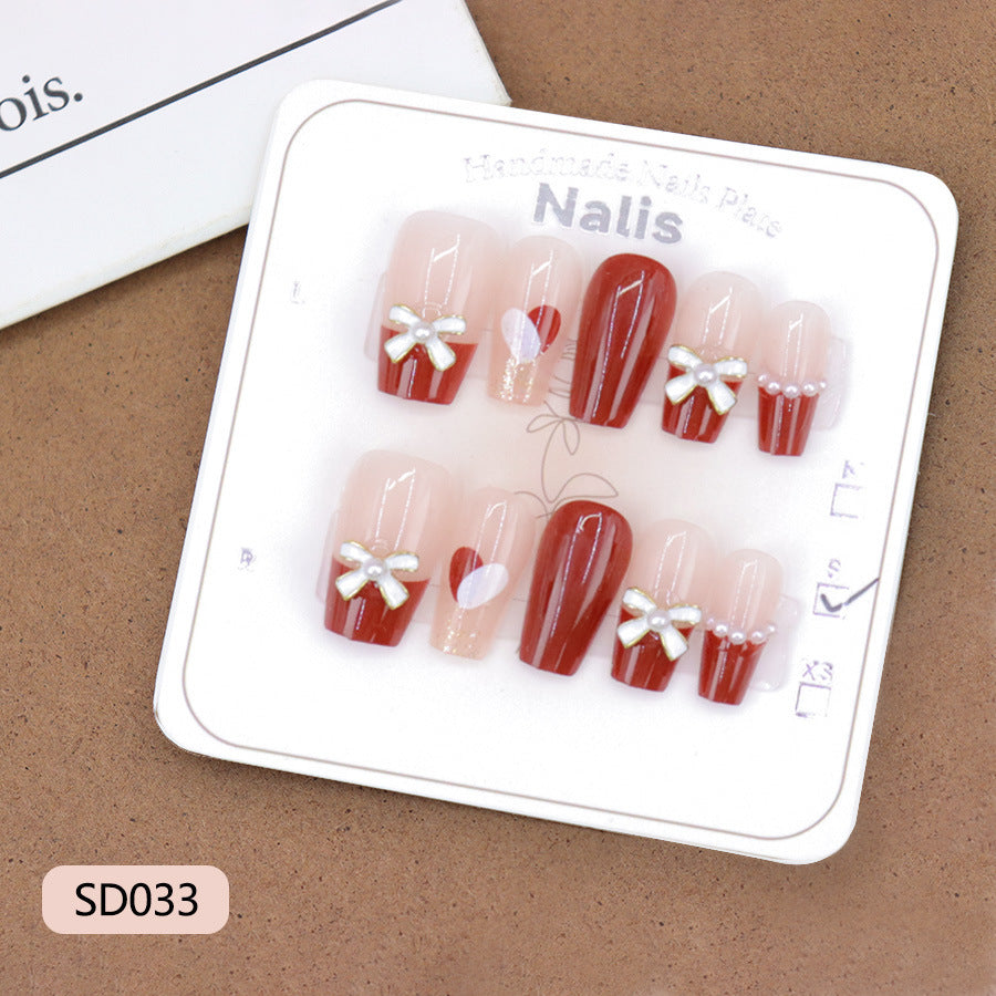 Red wine color simple French-style double-sided heart-shaped butterfly knot nail art
