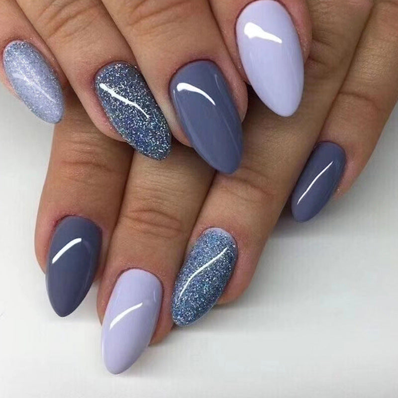 Matte purple glitter nail polish
