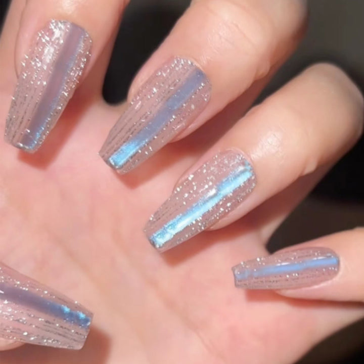 Blue striped cat eye nail polish