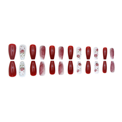 Red roses adorned with nails