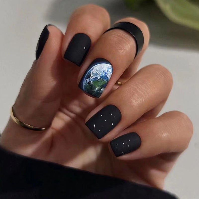 Dark blue and black graffiti nail art