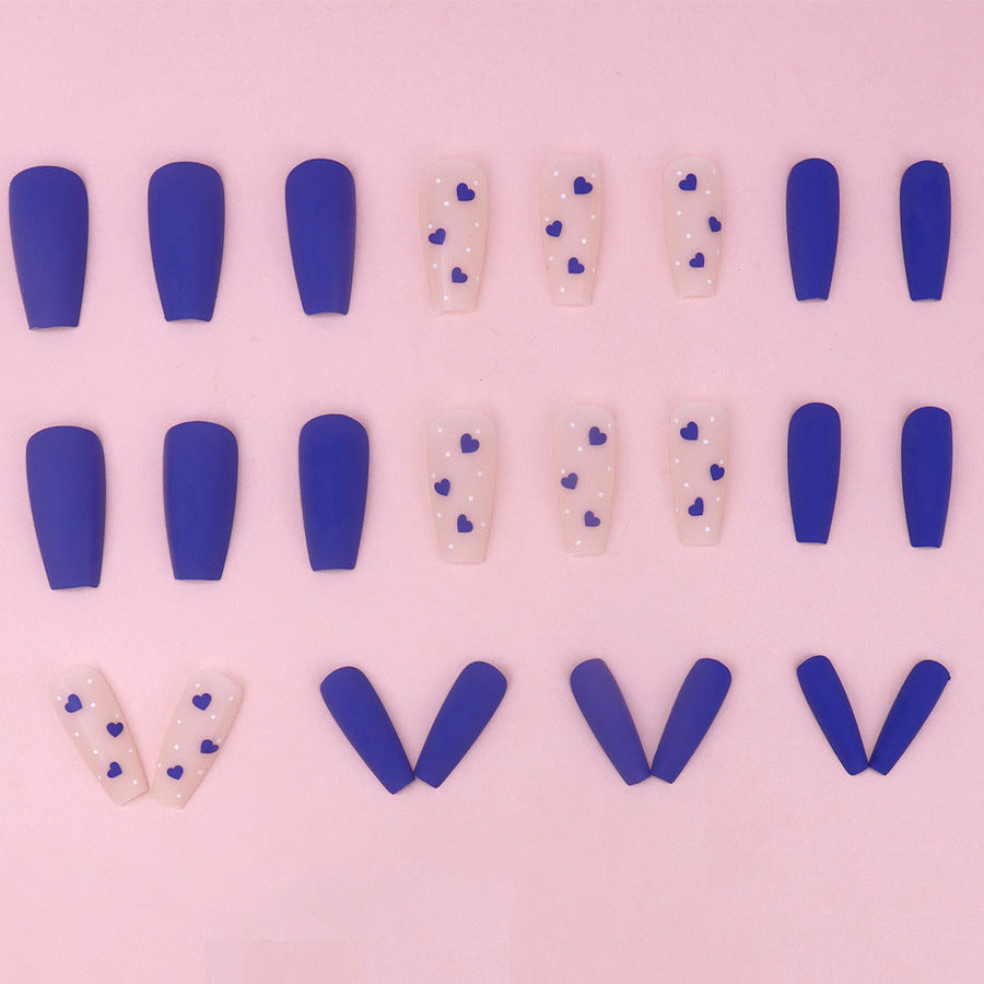 Blue heart nail polish in cool color palette