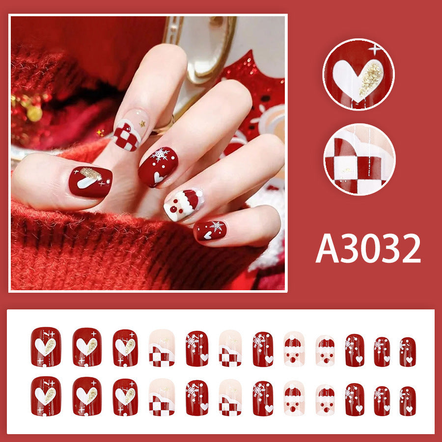 Santa Claus snowflake red checkered heart nail art