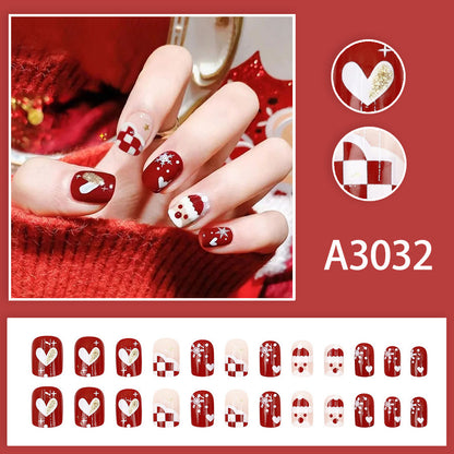 Santa Claus snowflake red checkered heart nail art
