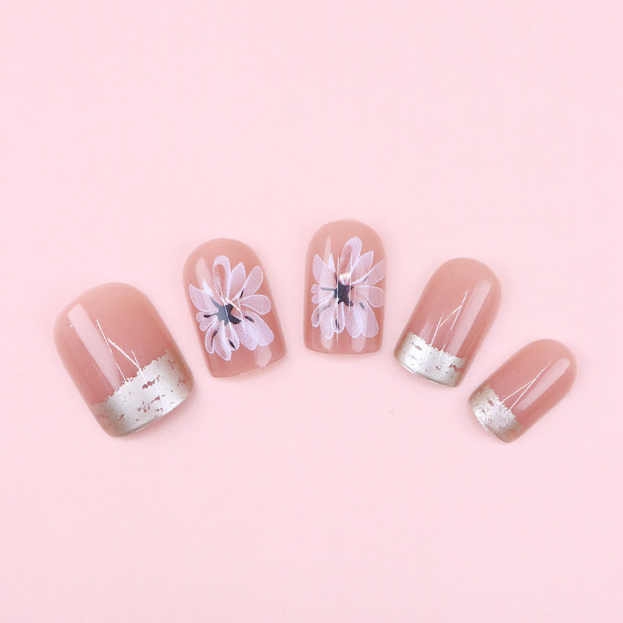 Flowers, tender leaves, beautiful nails
