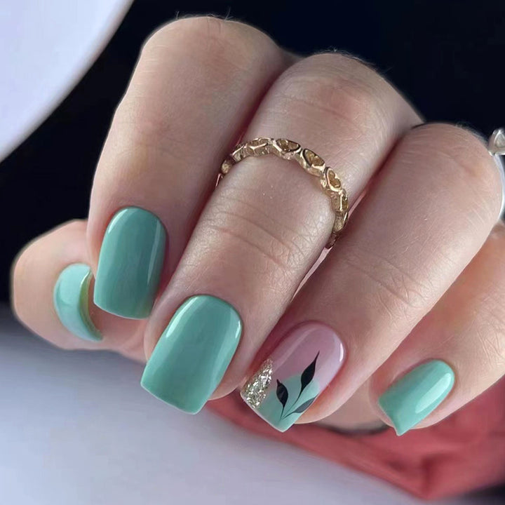 Leaf Buling's glittering green nail polish