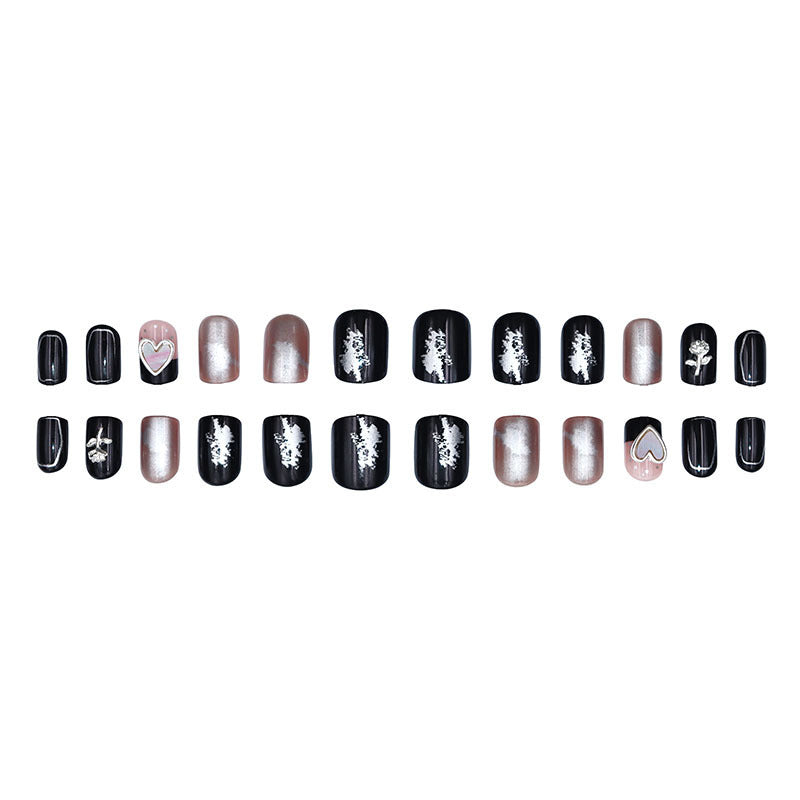 Black mirror-shaped heart-shaped rose gold manicure with diamonds