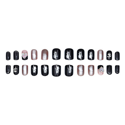 Black mirror-shaped heart-shaped rose gold manicure with diamonds
