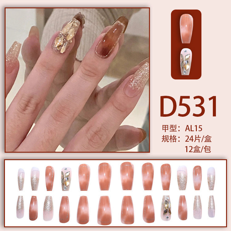 Ultra-glossy champagne-colored manicure