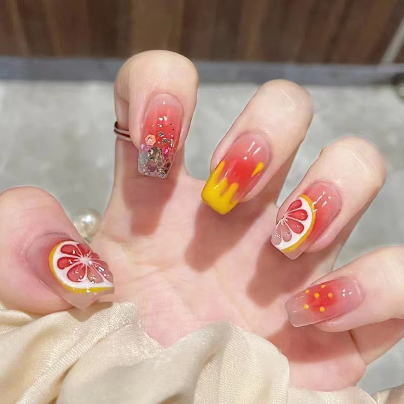 Red lemon manicure