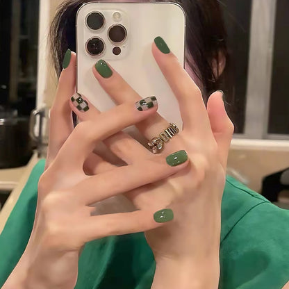 Green checkered nail polish