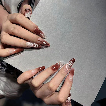 Long-style alluring butterfly snake-patterned dark brown sensual style nail art