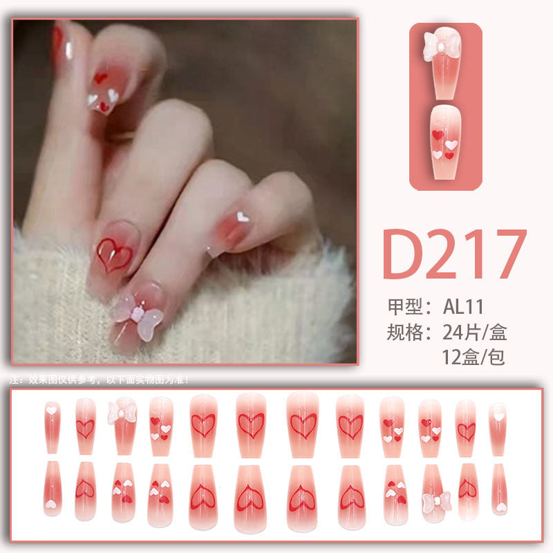 Mid-length pink diamond-style bow nail art