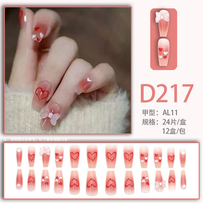 Mid-length pink diamond-style bow nail art