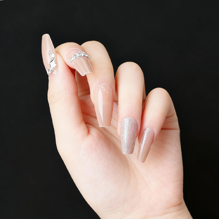 Simple nude-colored diamond-studded gradient shimmer nail polish