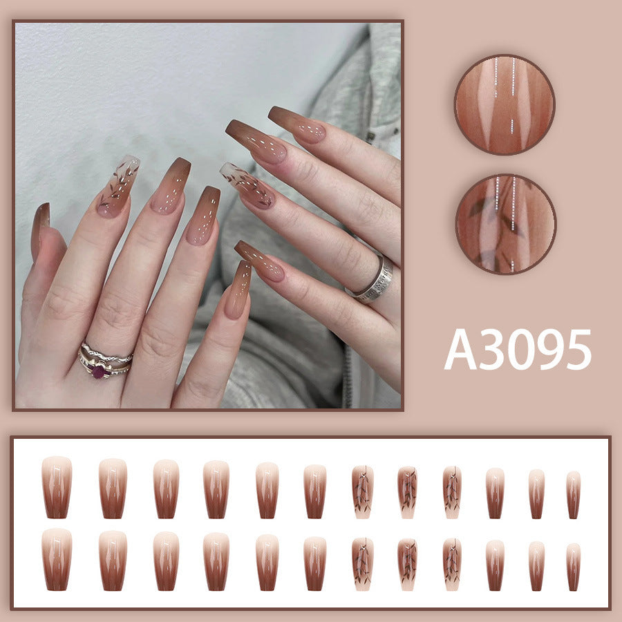 Fall and winter leaf nail art with caramel brown color, exuding a sophisticated and elegant vibe.
