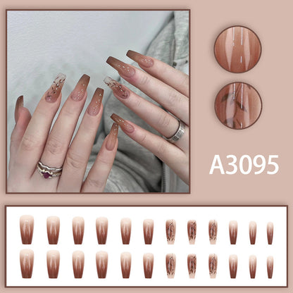 Fall and winter leaf nail art with caramel brown color, exuding a sophisticated and elegant vibe.