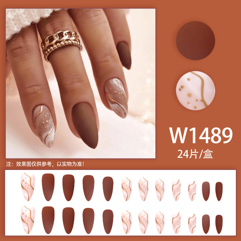 Sweet and cool girl style, brown gold-plated lines, almond-shaped manicure