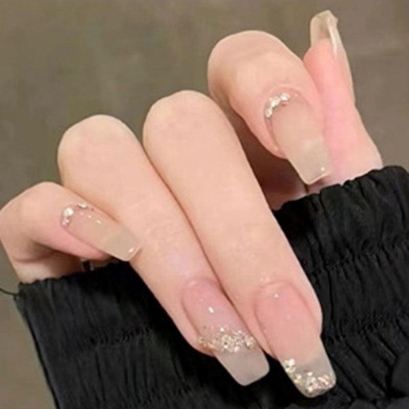 Sophisticated and sexy nude diamond style personalized manicure
