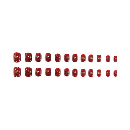 Dark red solid-colored manicure