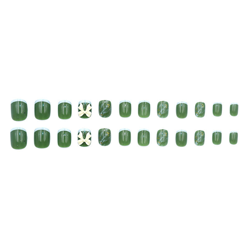 Diamond-studded bow-shaped nail polish