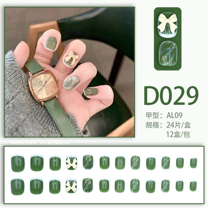 Diamond-studded bow-shaped nail polish