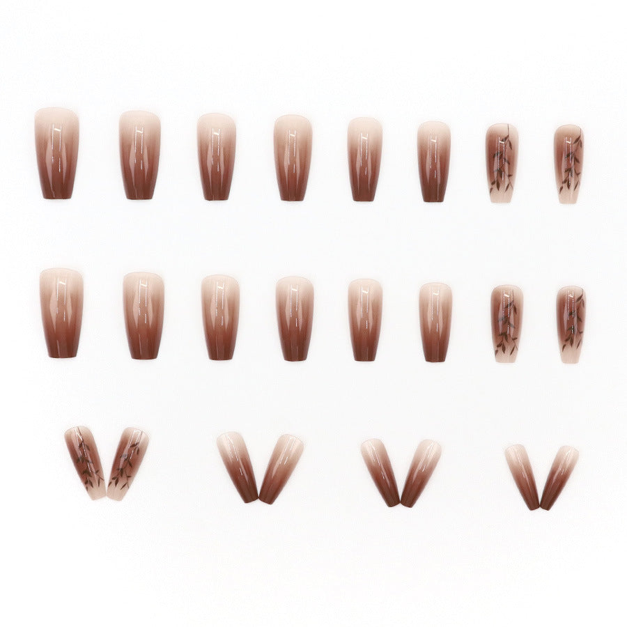 Fall and winter leaf nail art with caramel brown color, exuding a sophisticated and elegant vibe.