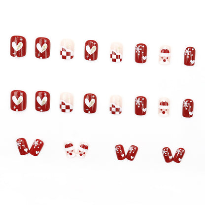 Santa Claus snowflake red checkered heart nail art