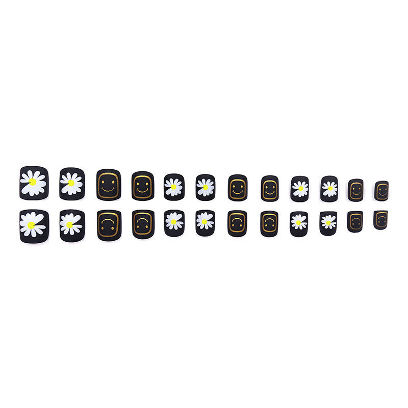 Black-colored small daisy smiling face manicure