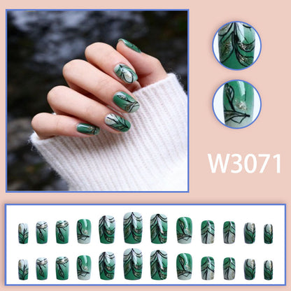 Emerald glitter nail polish