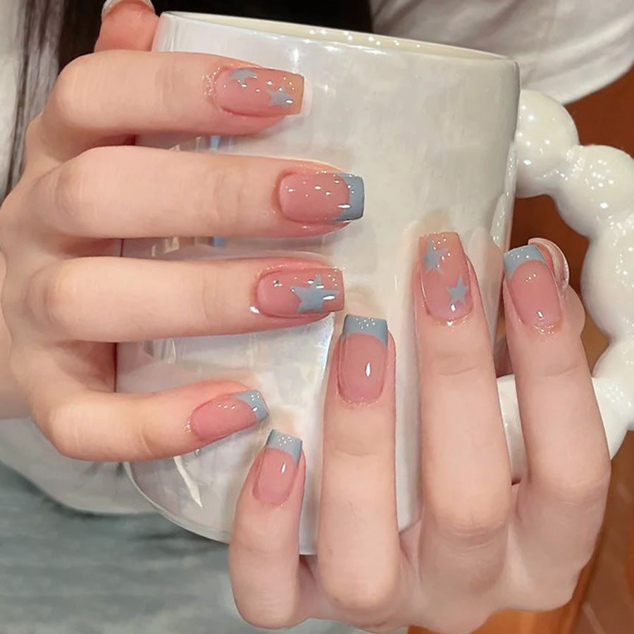 Young girl, pink stars, cute and beautiful nails