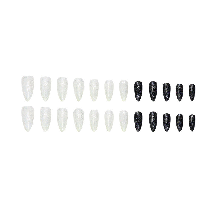 Long style almond-shaped nail polish in black and white style inspired by Ins