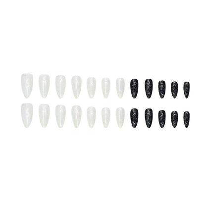 Long style almond-shaped nail polish in black and white style inspired by Ins