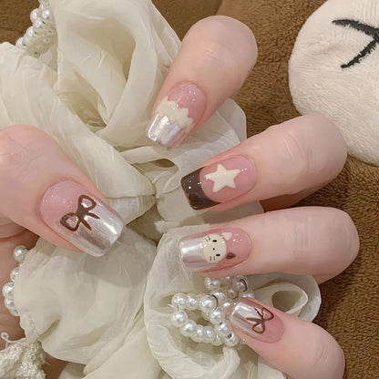 Ice cream cat with a brown bow-shaped nail polish