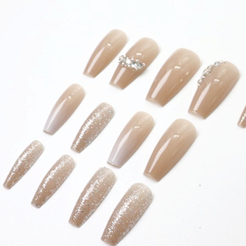 Simple nude-colored diamond-studded gradient shimmer nail polish