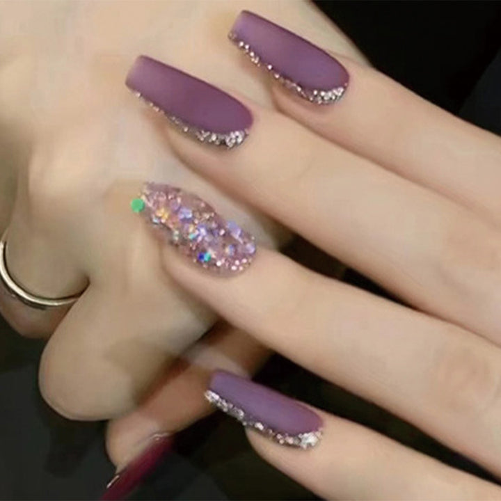 Purple grape color style of clothing and nail decoration